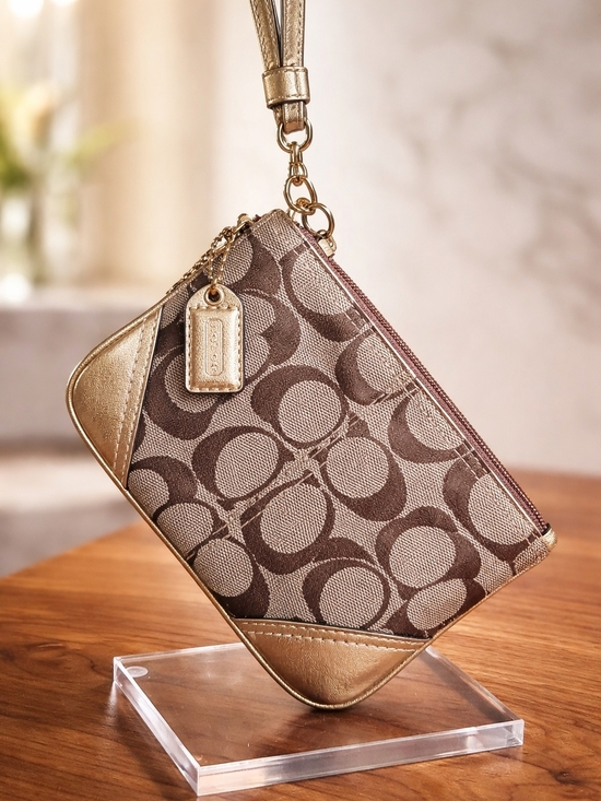 Coach Handbags - Coach Signature Canvas Wristlet in Brown and Gold
